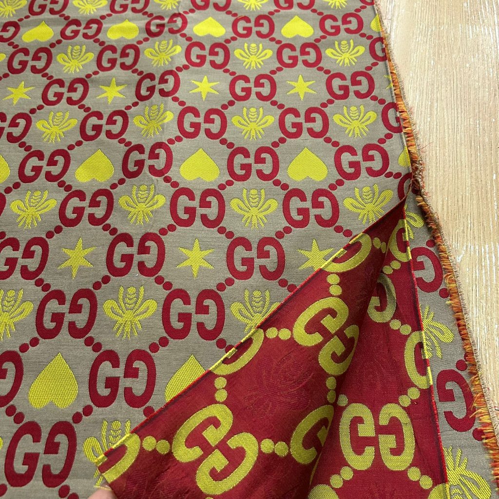 G35 Jacquard Fabric Yellow Red on Khaki editorial product context 2