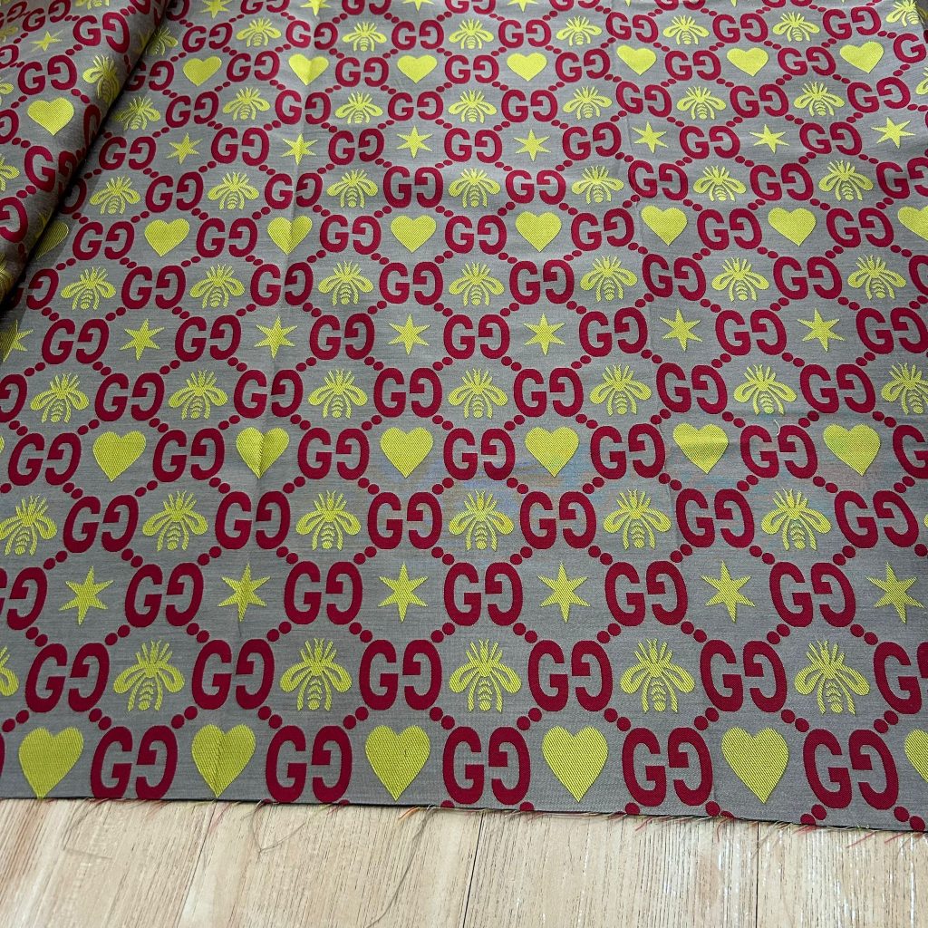 G35 Jacquard Fabric Yellow Red on Khaki editorial product context 3