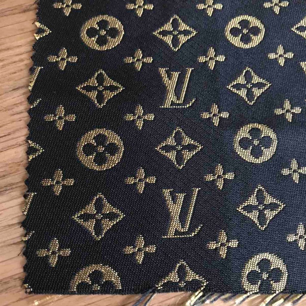L05 Mini Monogram Fabric Gold on Black editorial product context 1