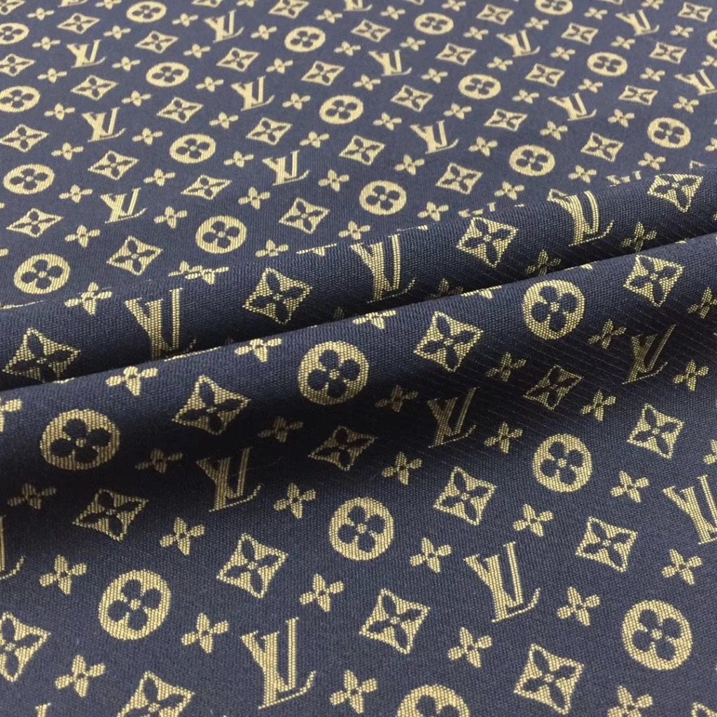 L05 Mini Monogram Fabric Gold on Black editorial product context 3
