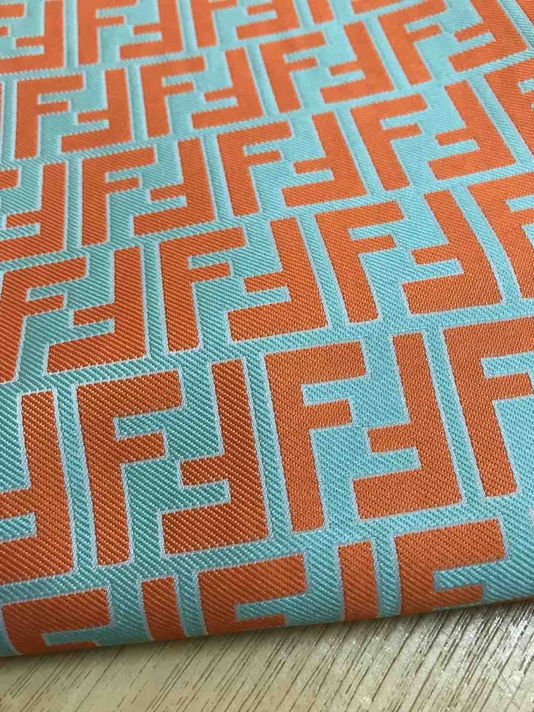 F03 Designer Inspired FF Fabric Orange Green editorial product context 3