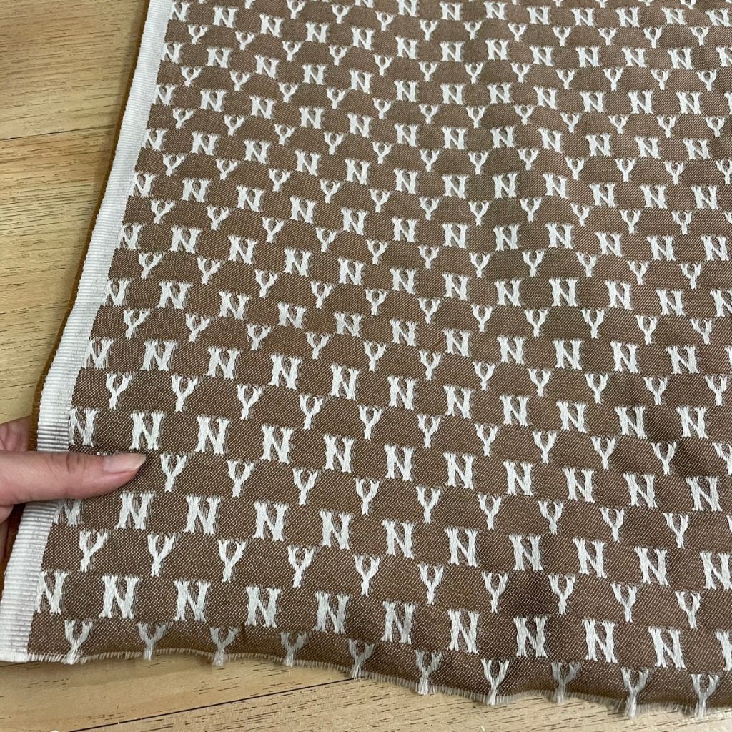 M02 NY Monogram Jacquard Fabric Blue and Khaki editorial product context 3