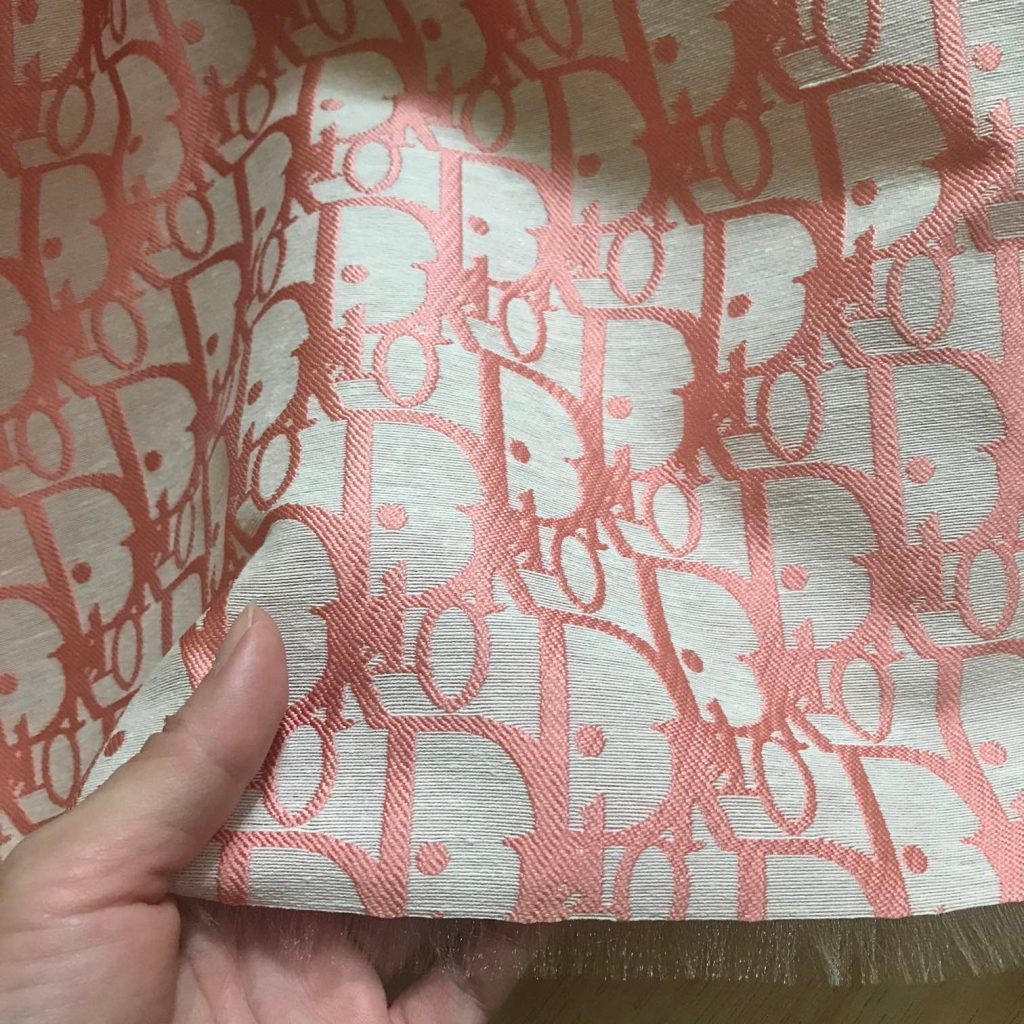 D02 Jacquard Fabric Peach Pink on Light Grey editorial product context 1