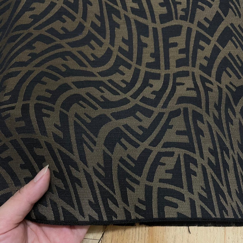 F10 Jacquard Fabric Brown FF Vertigo motif editorial product context 1