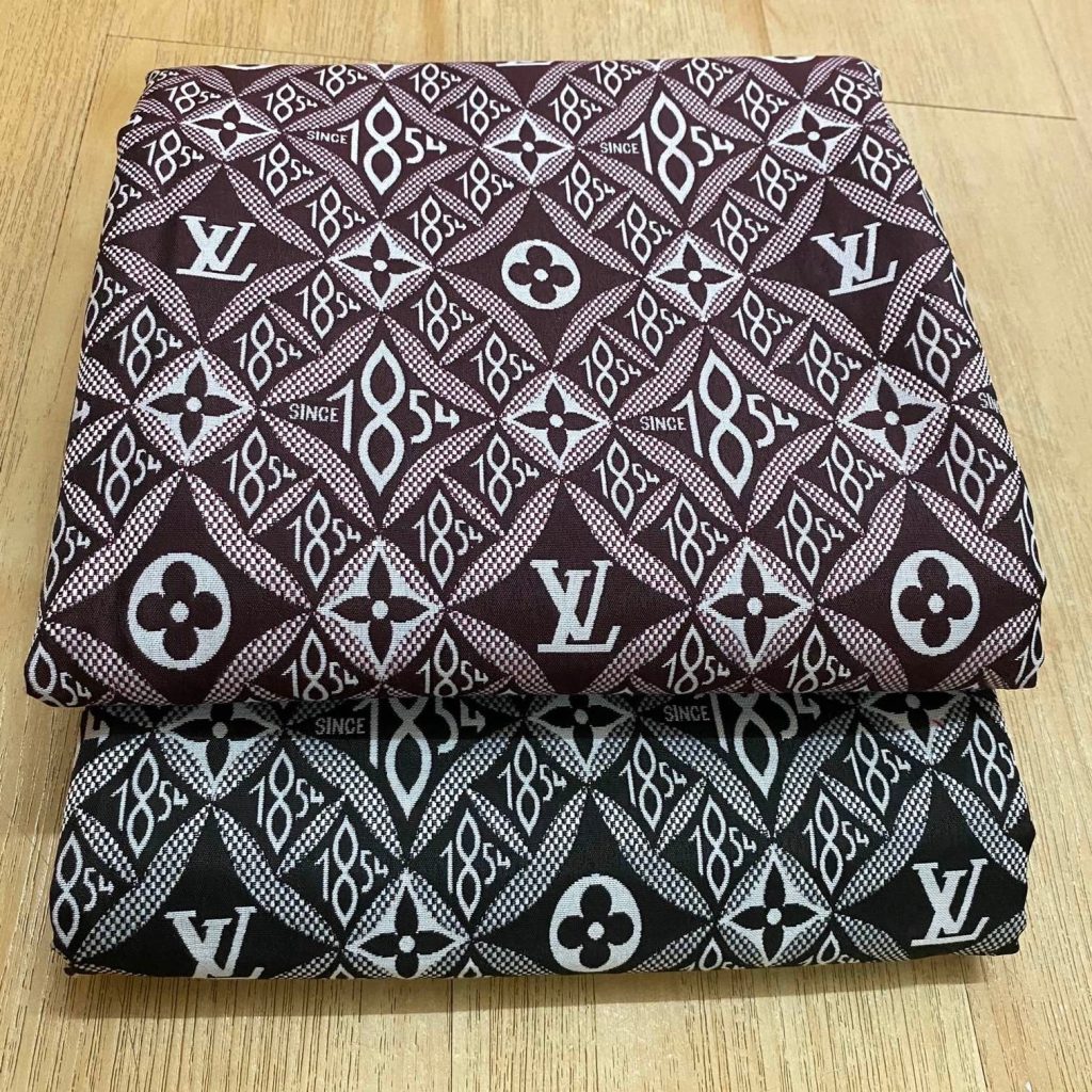 L15 Jacquard Fabric SINCE 1854 Reddish Brown editorial product context 2