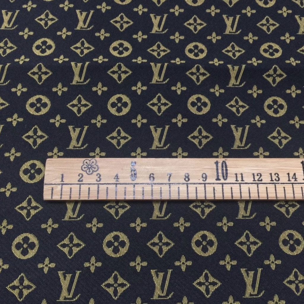 L05 Mini Monogram Fabric Gold on Black editorial product context 2